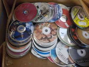 lot 200 image: 300 DVDs, CDs, Audio Books and Ga...