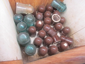 lot 94 image: Wooden Box & Insulators