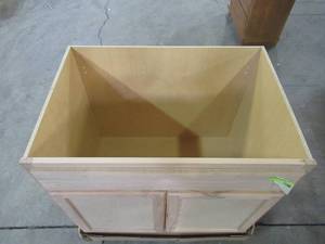 lot 125 image: Hampton Bay Hampton Assembled 36x34.5x24 in. Sink Base Kitchen Cabinet in Unfinished Beech KSB36-UFDF