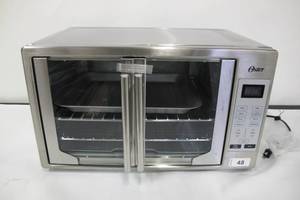 lot 48 image: Oster Digital French Door Oven, Stainless Steel