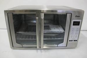 lot 49 image: Oster Digital French Door Oven, Stainless Steel