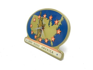 lot 35 image: Vintage 1940s Tin Litho GOD BLESS AMERICA Desk Clock