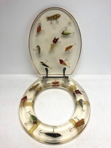 lot 98 image: Vintage 1970s Lucite Fishing Lure Toilet Seat