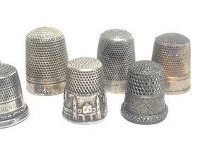 lot 112 image: Lot of 9 Antique Sterling Silver Thimbles