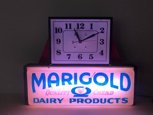 lot 155 image: Working Vintage Deco MARIGOLD Dairy Products Lighted Advertising Clock Sign