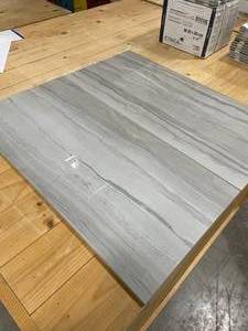 lot 007 image: 55 SF Action Drift 11 x 23 Porcelain Tile