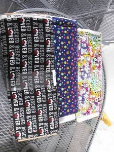 lot 13 image: (3) Rolls of Fabric (Dog Related)...
