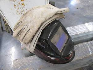 lot 76 image: Welding Helmet & Gloves...