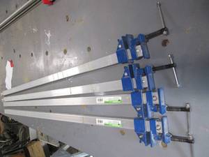lot 99 image: (4) 48 Bar Clamps See Photos...