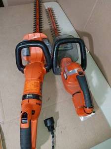 lot 19 image: 20 in. 3.8 Amp Corded Electric Hedge Trimmer & 22 in  Lithium-Ion Cordless Hedge Trimmer Battery and Charger not included  by BLACKDECKER- used