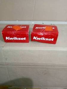 lot 52 image: Halifax Square Matte Black Privacy BedBath Door Lever by Kwikset- set of 2 - open box not used