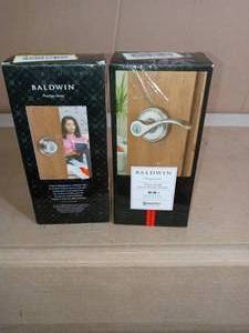 lot 57 image: Prestige Tobin Satin Nickel Entry Door Lever Featuring SmartKey Security & Prestige Satin Nickel Single Cylinder Round Deadbolt Featuring SmartKey Security by Baldwin-set of 2 - not used