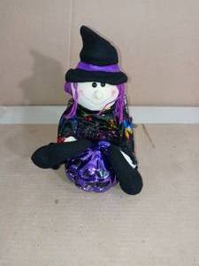lot 70 image: Purple halloween rag doll- not used