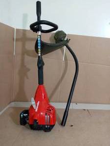 lot 73 image: 2-Cycle 26 CC Curved Shaft Gas Trimmer by Homelite- used