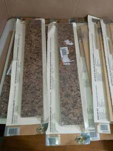 lot 84 image: Laminate Endcap Kit in Milano Brown with Tempo Edge by Hampton Bay- mixed lot