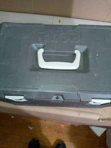 lot 85 image: 18 in. 38cc 2-Cycle Gas Chainsaw with Heavy Duty Case by RYOBI- used