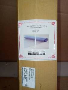 lot 93 image: Clear 2 ft. 2 in. x 12 ft. Vinyl Carpet Protector Runner Mat by Berrnour Home- open box not used