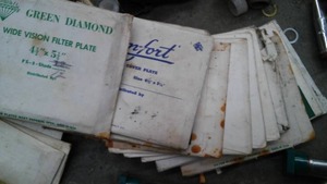 lot 23 image: MISC WELDING TIPS AND COVER PLATES.