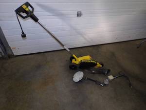 lot 4 image: Lawn Edger and landscape Lights