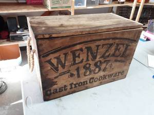 lot 1 image: Wenzel Cast Iron Cookware Crate With Rope Handles 22x11x15