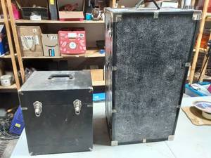 lot 33 image: 2-Musical Instrument Cases.  1-On Wheels 16x12x31,  Other 14x11.5x16