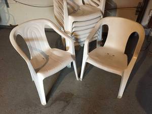 9 White Plastic Stacking Chairs