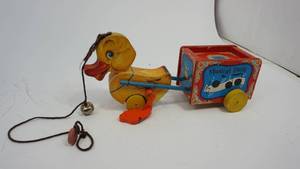 lot 15 image: Vintage Childrens Fisher Price Pull Musical Duck Toy