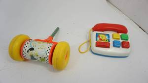 lot 18 image: Vintage Fisher Price Childrens Toy Telephone  Vintage Fisher Price 1963 Melody Chime Roller Push Toy