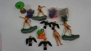 lot 53 image: Vintage Disney Tarzan Figures  Sleeping Beauty Diablo Raven Figures  Jungle Book Figures