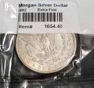 lot 12 image: 1882 MORGAN SILVER DOLLAR XF IN SEALED LITTLETON PACKAGE