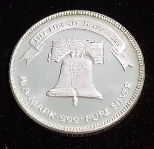 lot 13 image: 1 TROY OZ. .999 FINE SILVER 1983 A-MARK LIBERTY