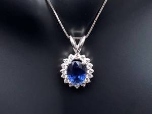 lot 8 image: Oval Cut Blue Sapphire and Diamond Estate Pendant in 14k White Gold $5800 Retail