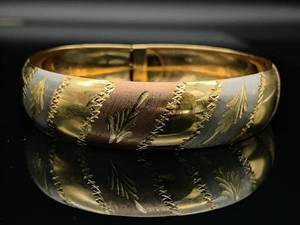 lot 53 image: Lovely Tri-Color Gold Estate Bracelet $899 Retail