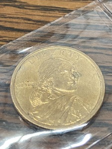 lot 6 image: (4) Sacagawea $1 Coins