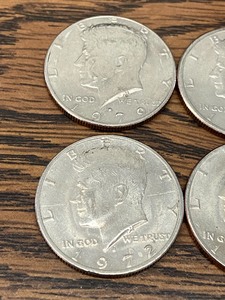 lot 12 image: (8) Kennedy Half Dollars