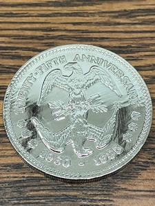 lot 25 image: Commemorative 1985 Kennedy Coin