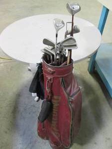 lot 24 image: Lot of Golf Clubs in Spaulding Bag ...