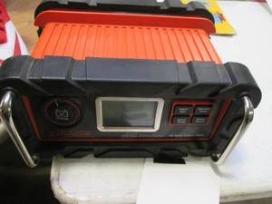 lot 36 image: Black & Decker Battery Charger & En...