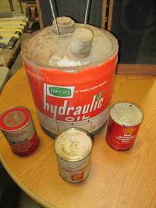 lot 40 image: Lot of Vintage Oil Cans, 1 Still F...