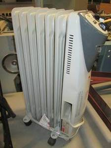 lot 48 image: Dayton Oil Filled Space Heater...