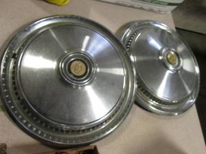 lot 79 image: Set of (2) Chrysler Cordoba Hub Cup...