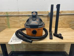 lot 12 image: RIDGID 4 Gal. 5.0-Peak HP Portable WetDry Shop Vacuum with Filter, Hose and Accessories