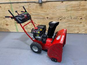 lot 2 image: TROY-BILT 24 in. 208 cc Two-Stage Gas Snow Blower with Electric Start Self Propelled