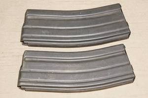 lot 40 image: 2 Cooper Industries 5.56 Magazines