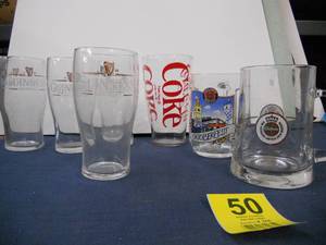 lot 50 image: 4 Guiness Glasses, Coke Glass, Oktoberfest Beer Mug, and Warfiener (German) Beer Mug