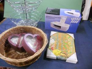 lot 71 image: Jewelry, Alarm Clock Radio, Rotating Metal Basket Turntable, Dcor