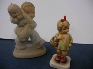lot 49 image: Hummel Girl with Basket and The Future - God Bless Em Enesco Brother Figure