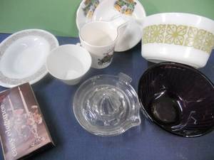 lot 74 image: Green and White Pyrex, Brown and White Pyrex Serving Dish, Cranberry Pyrex, Clear Glass Reamer Juicer, Tractor Cups and Saucers, Vintage in Box Flower Frog