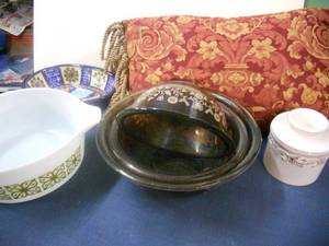 lot 90 image: Pyrex 1 green and white and 3 floral on smoky color, painted dish, fringed throw pillow, butter crock