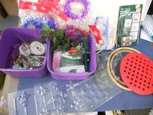 lot 41 image: Crafts Candy Molds, Pie cutter, embroidery hoops, battery light set, garland, ribbon, plastic bins ETC